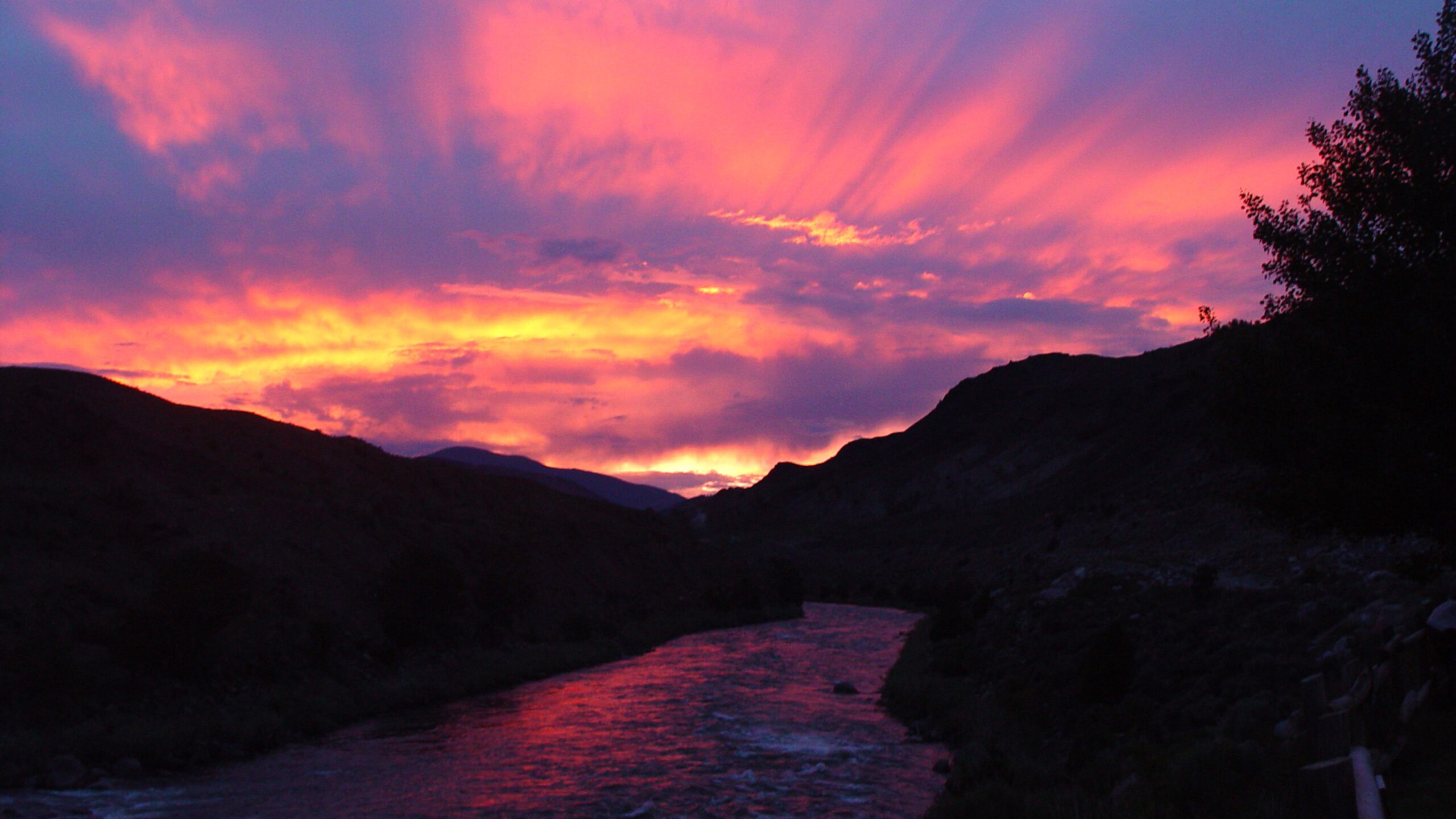 River Sunset Glow 4K Wallpaper