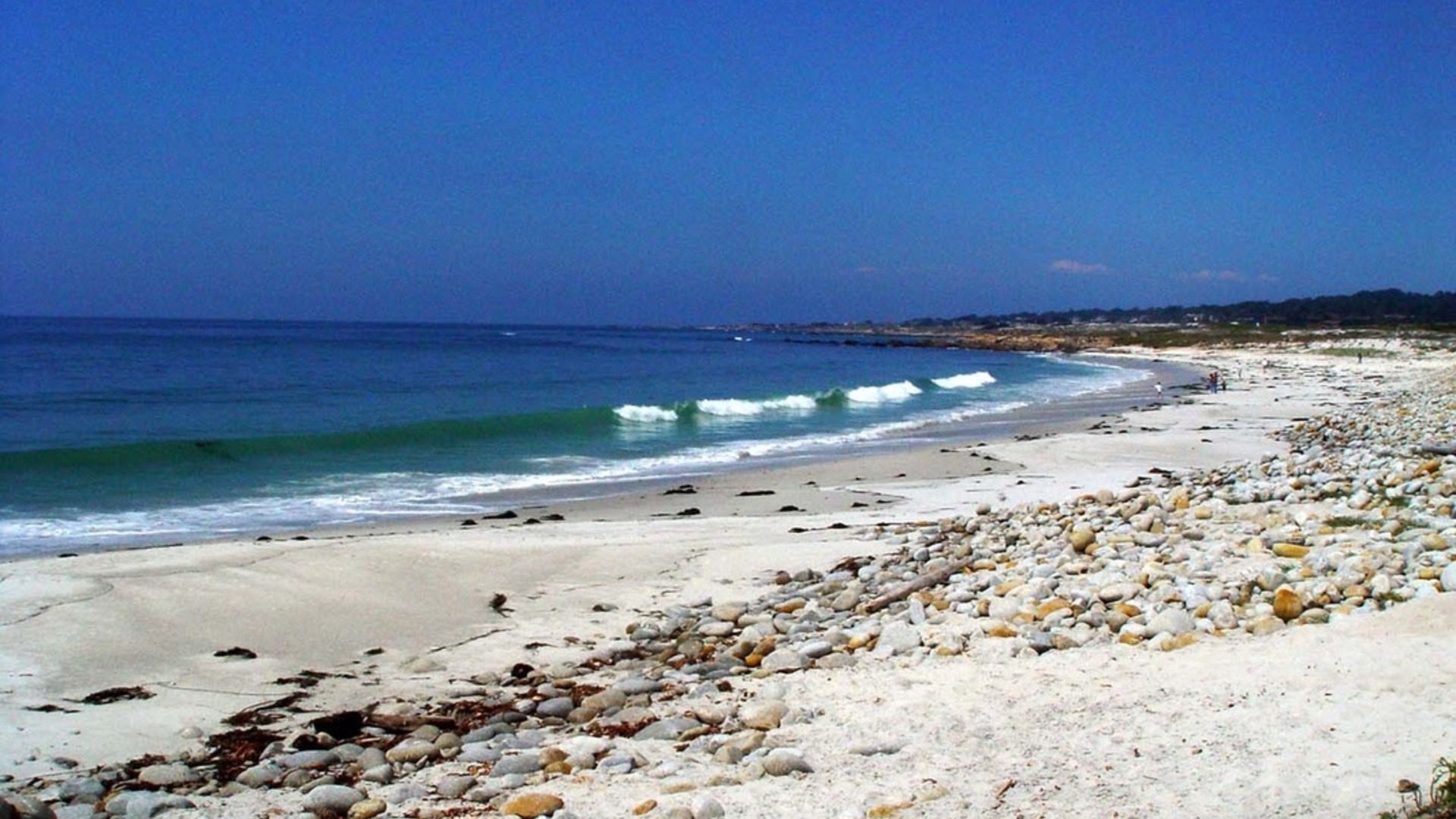 Rocky White Sand Beach with Ocean Waves Wallpaper