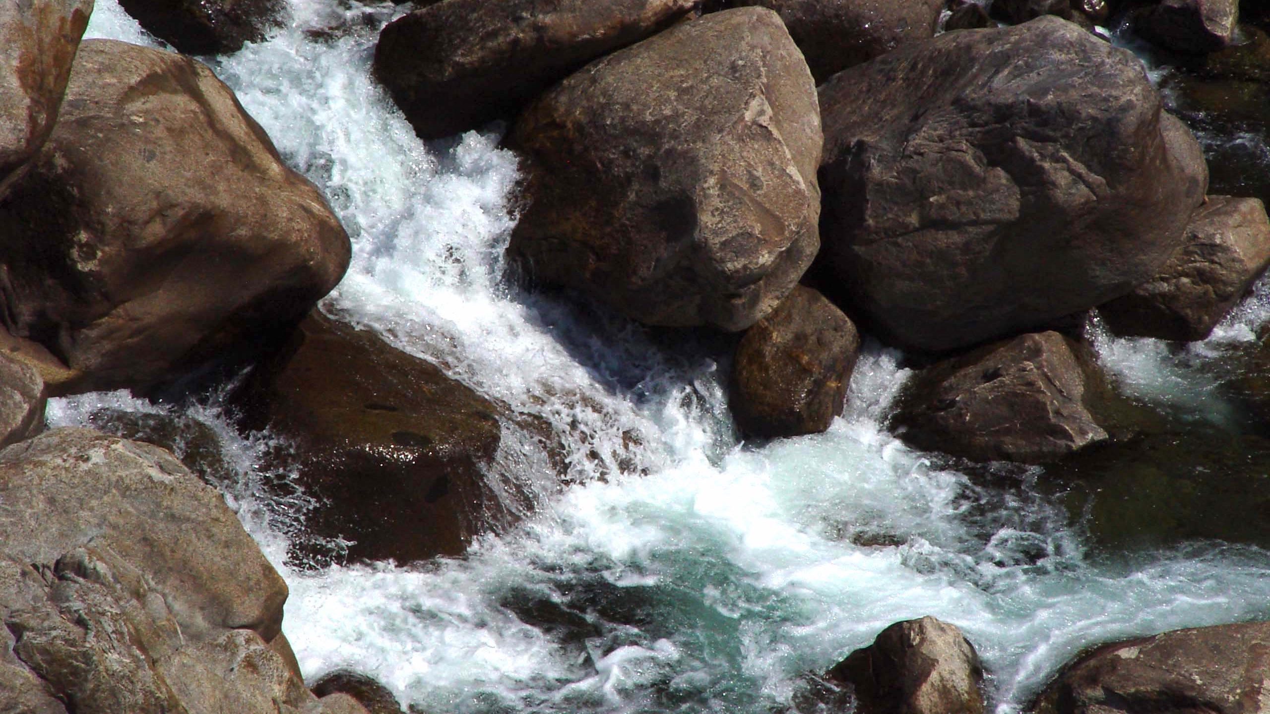 Rushing Water Over Rocks – Whitewater Stream QHD Wallpaper
