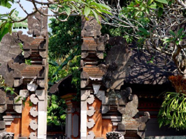 Decorative Balinese temple gate with carved stone details