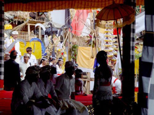People gathering during a traditional Balinese ceremony in Ubud
