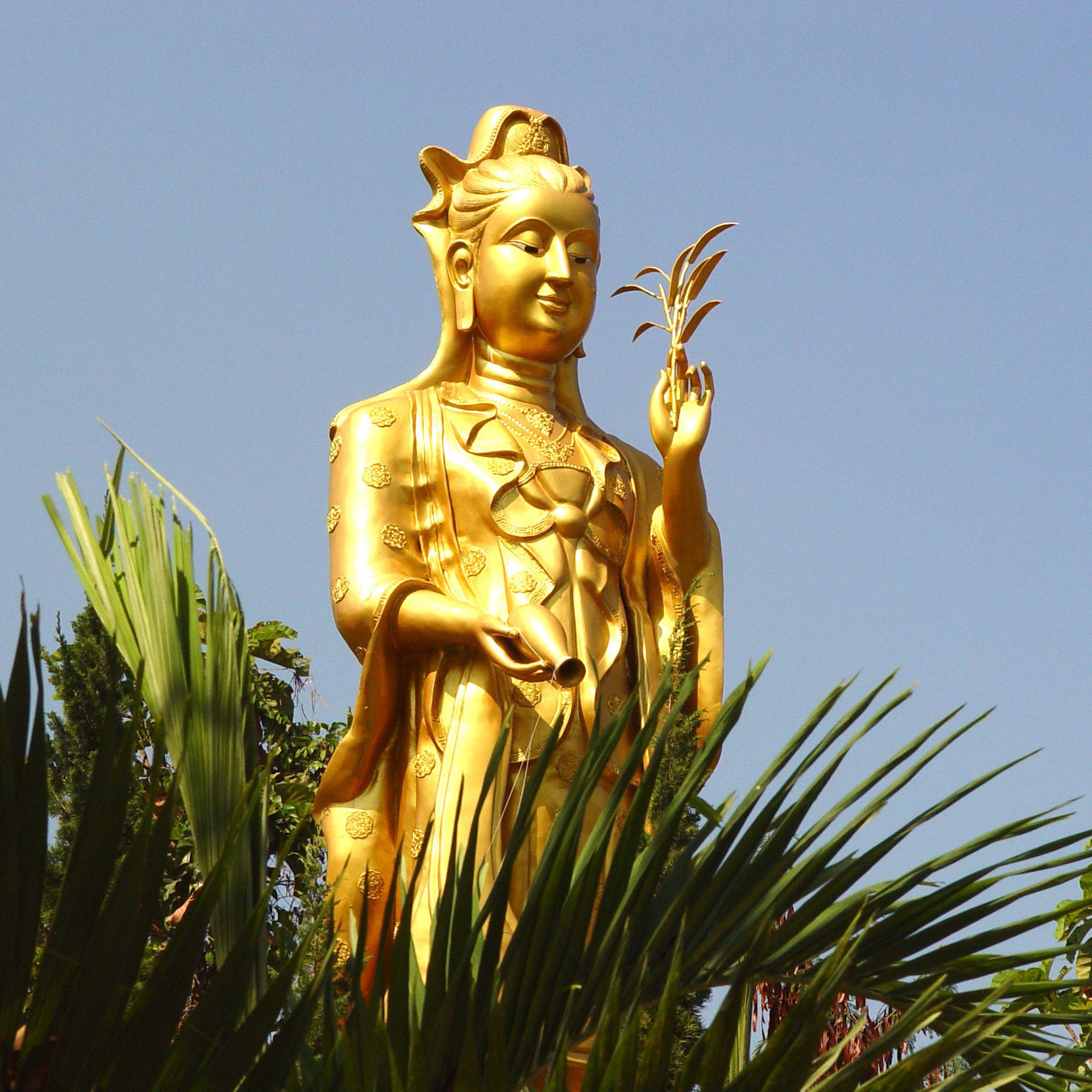Golden Buddhist Goddess Statue in Thailand – Square Wallpaper