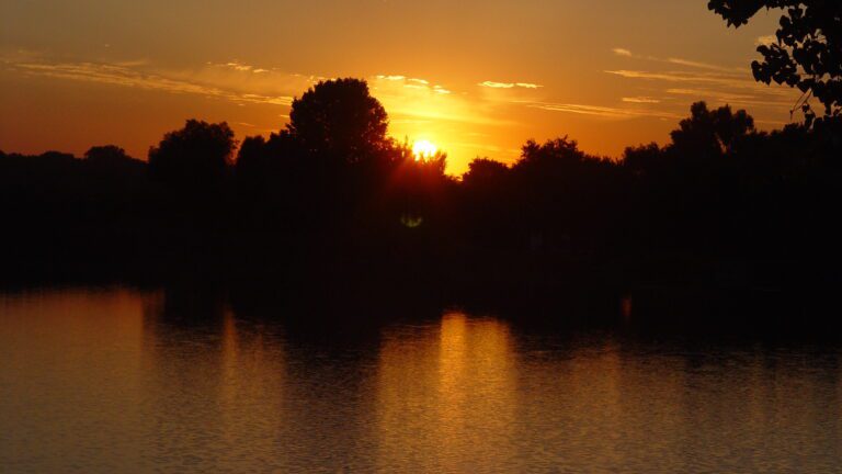 Golden Evening Sunset Over Calm Lake