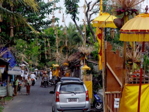 Village street decorated for a Balinese celebration in Ubud