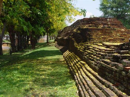 Ancient brick wall and moat area surrounding Chiang Mai's historic Old City.