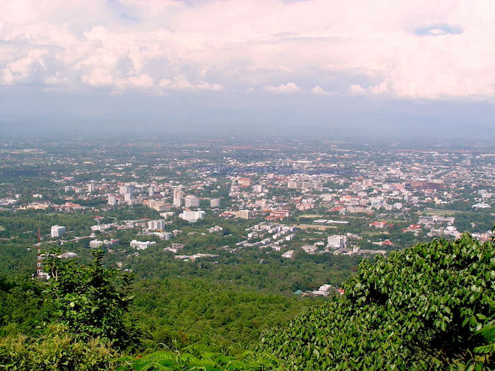 Panoramic view of Chiang Mai from Doi Suthep overlooking the city and surrounding mountains.