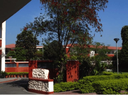 Landscaped courtyard and architecture at the Dera in Beas, India.