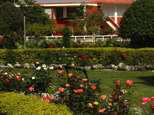 Colorful flower gardens at the Dera spiritual center in Beas, India.