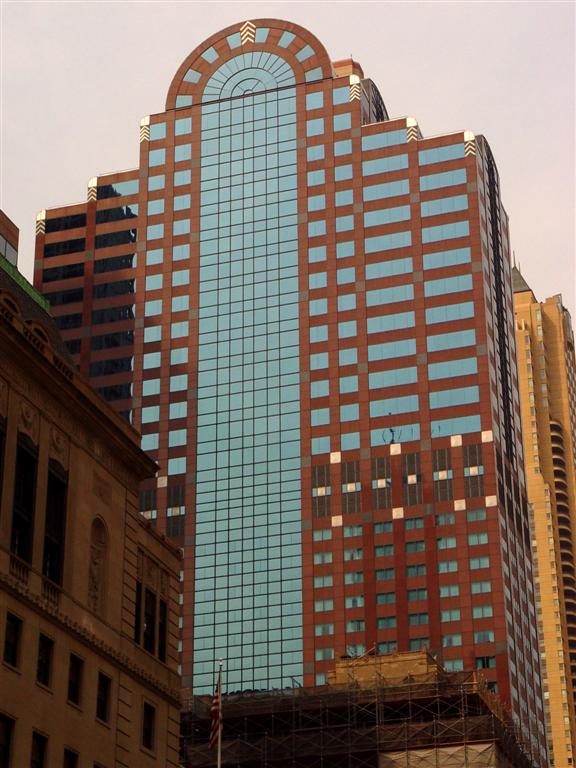 Modern office tower rising above downtown Chicago.