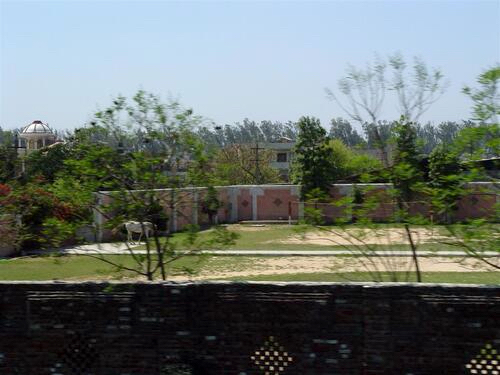 Landscaped grounds and walls surrounding the Dera near Beas, India.