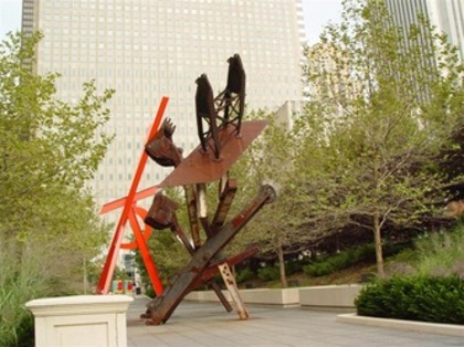 Abstract modern sculpture displayed in a downtown Chicago plaza.