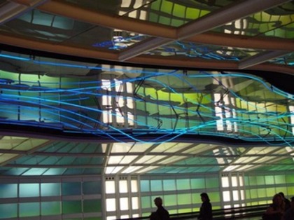 Close-up view of Michael Hayden's Sky's the Limit neon sculpture at O'Hare International Airport.